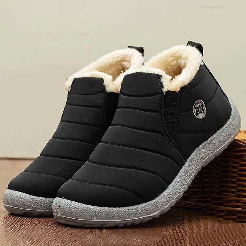 Botas de mujer de nieve Zapatos unisex de moda Slip On Platform Zapatos para mujeres Botines Zapatos de invierno impermeables de