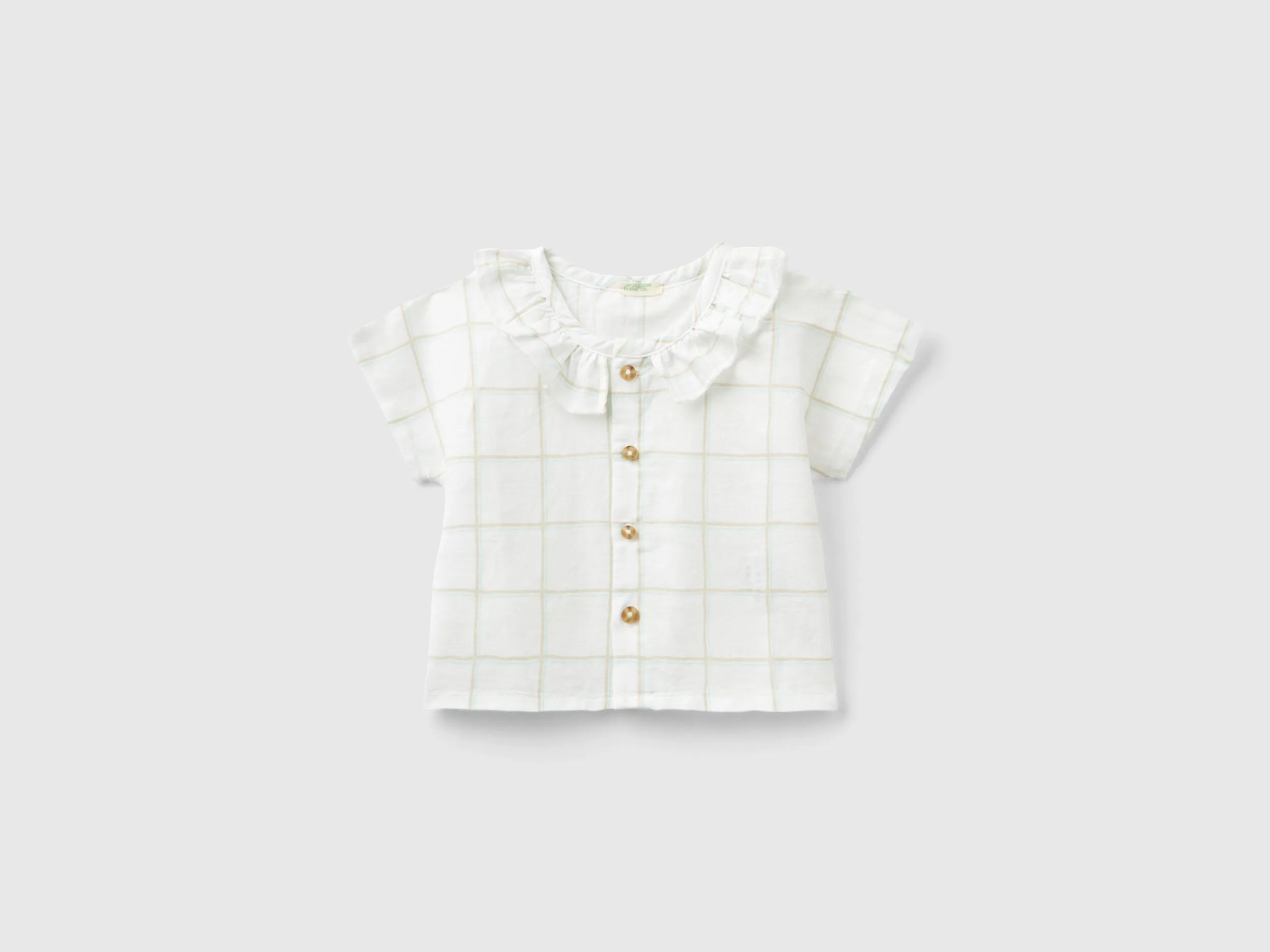 Camisa de cuadros con volantes