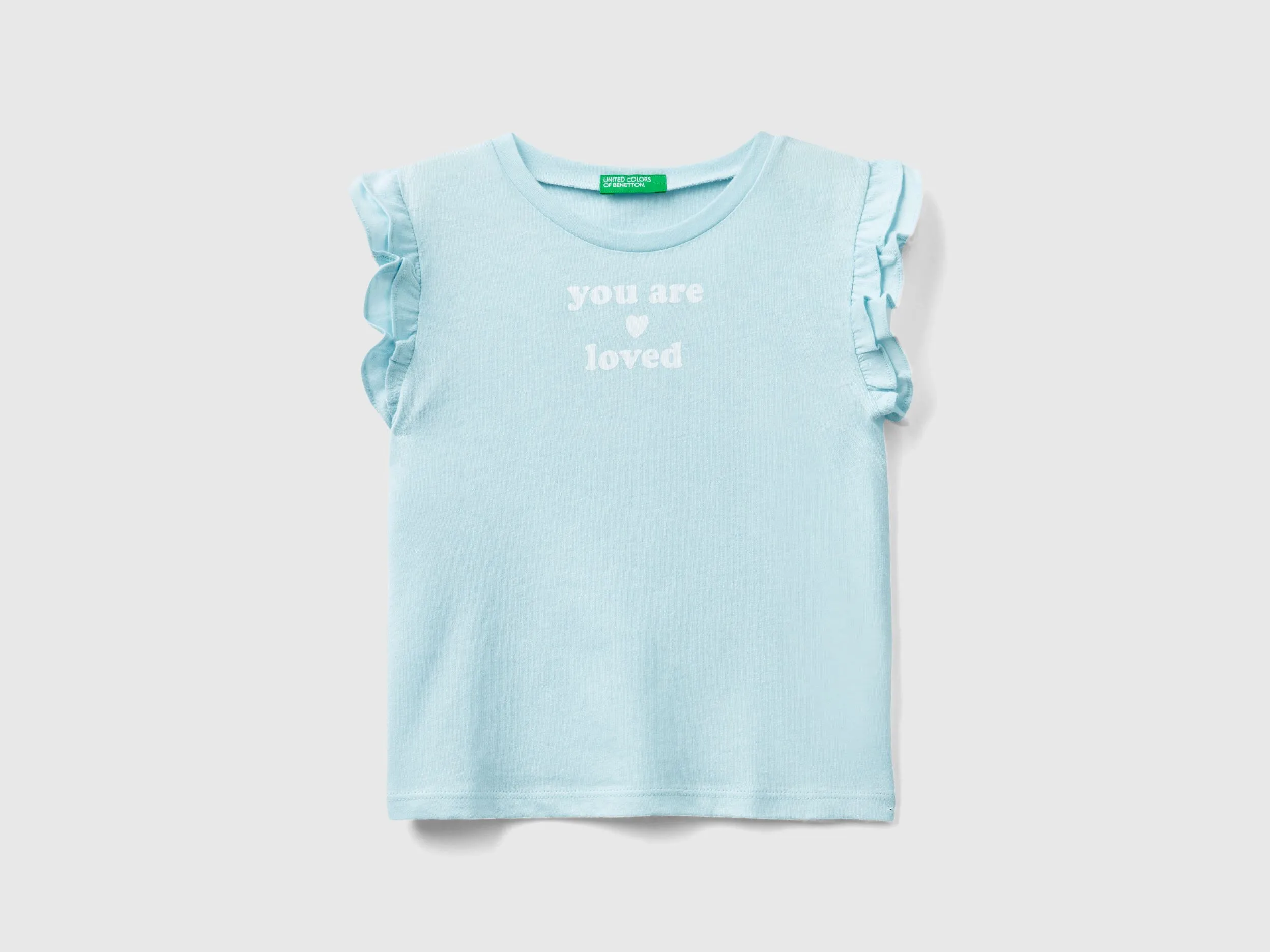 Camiseta con volantes y estampado