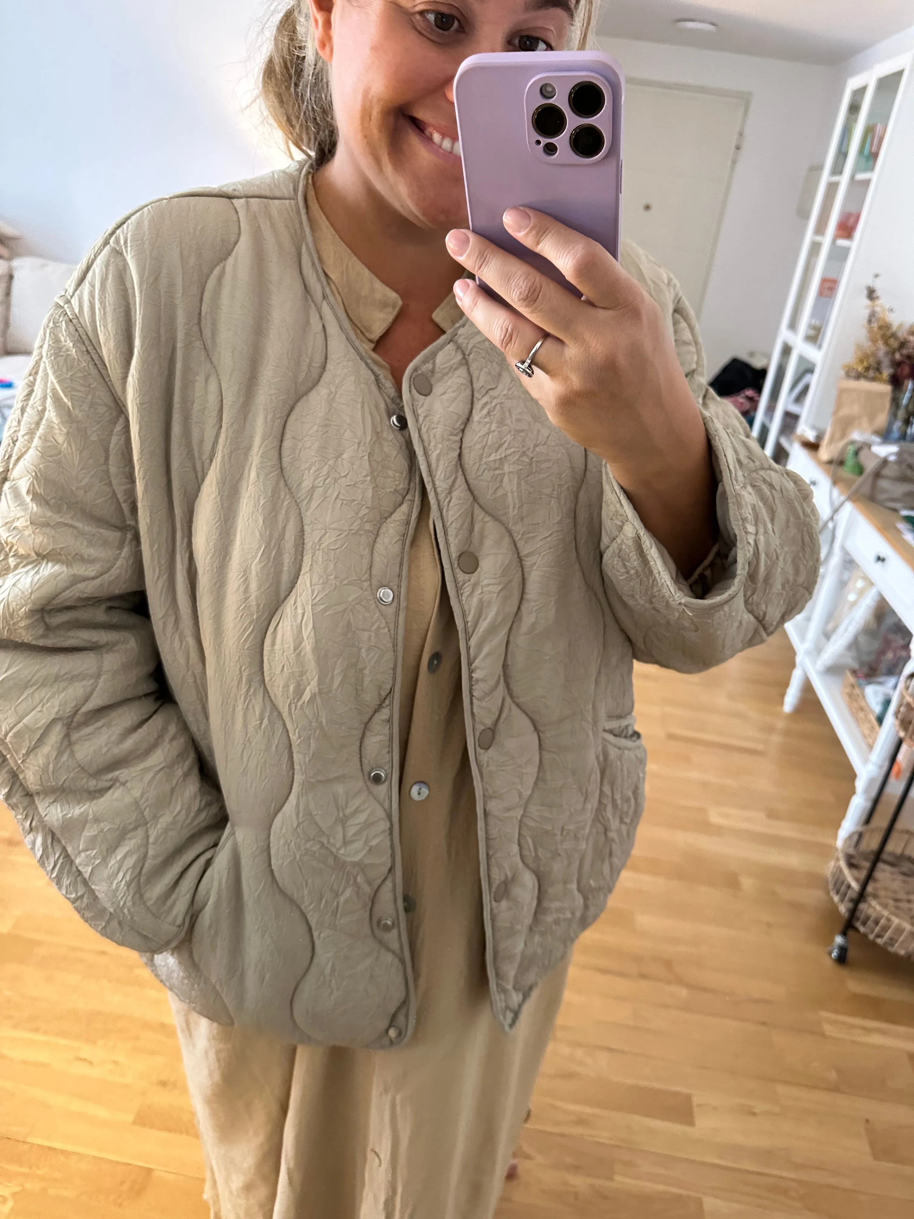 H&M. Plumas beige ligero T.xxl