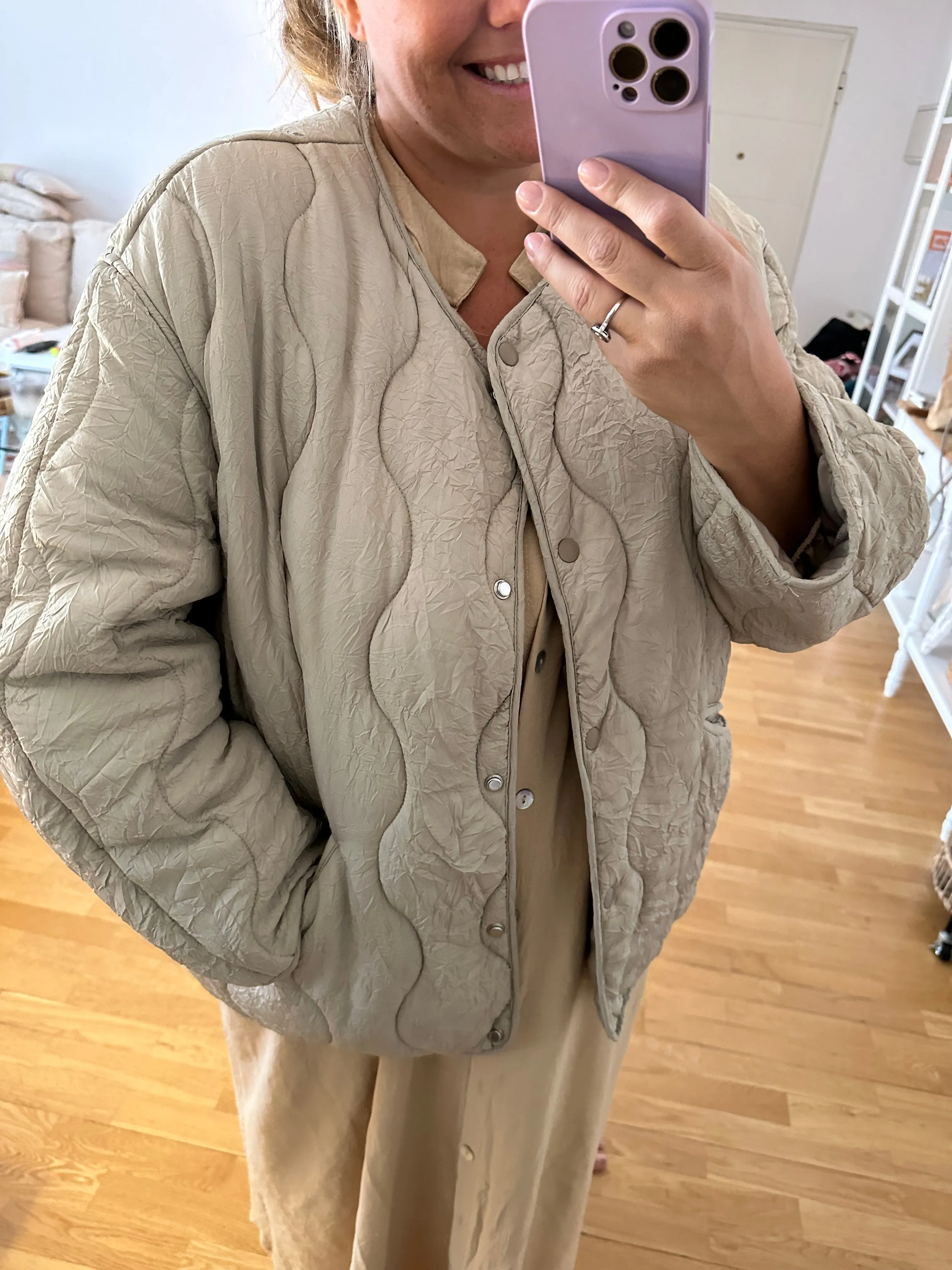 H&M. Plumas beige ligero T.xxl