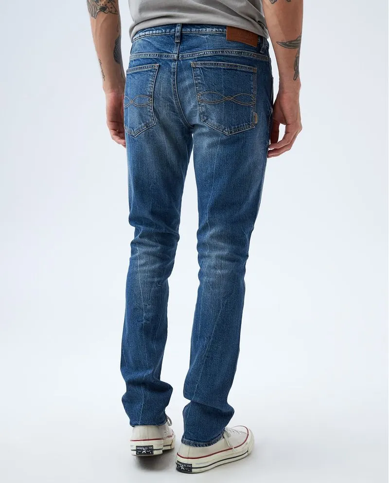 Jean Slim en tono medio para hombre