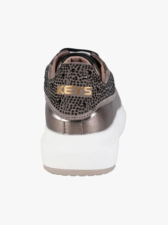 Keys Zapatillas bajas de mujer con tachuelas.