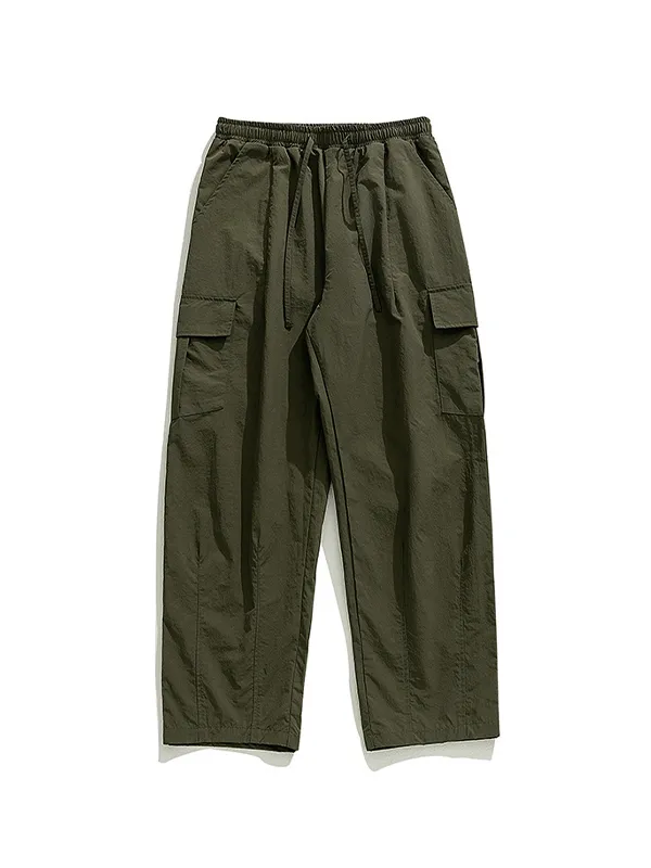 Pantalones cargo con cordón y bolsillos grandes texturizados para hombre