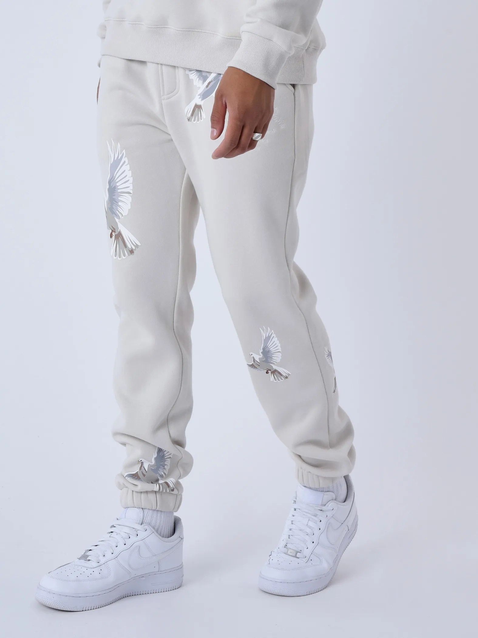 Pantalones de chándal sueltos con estampado de palomas