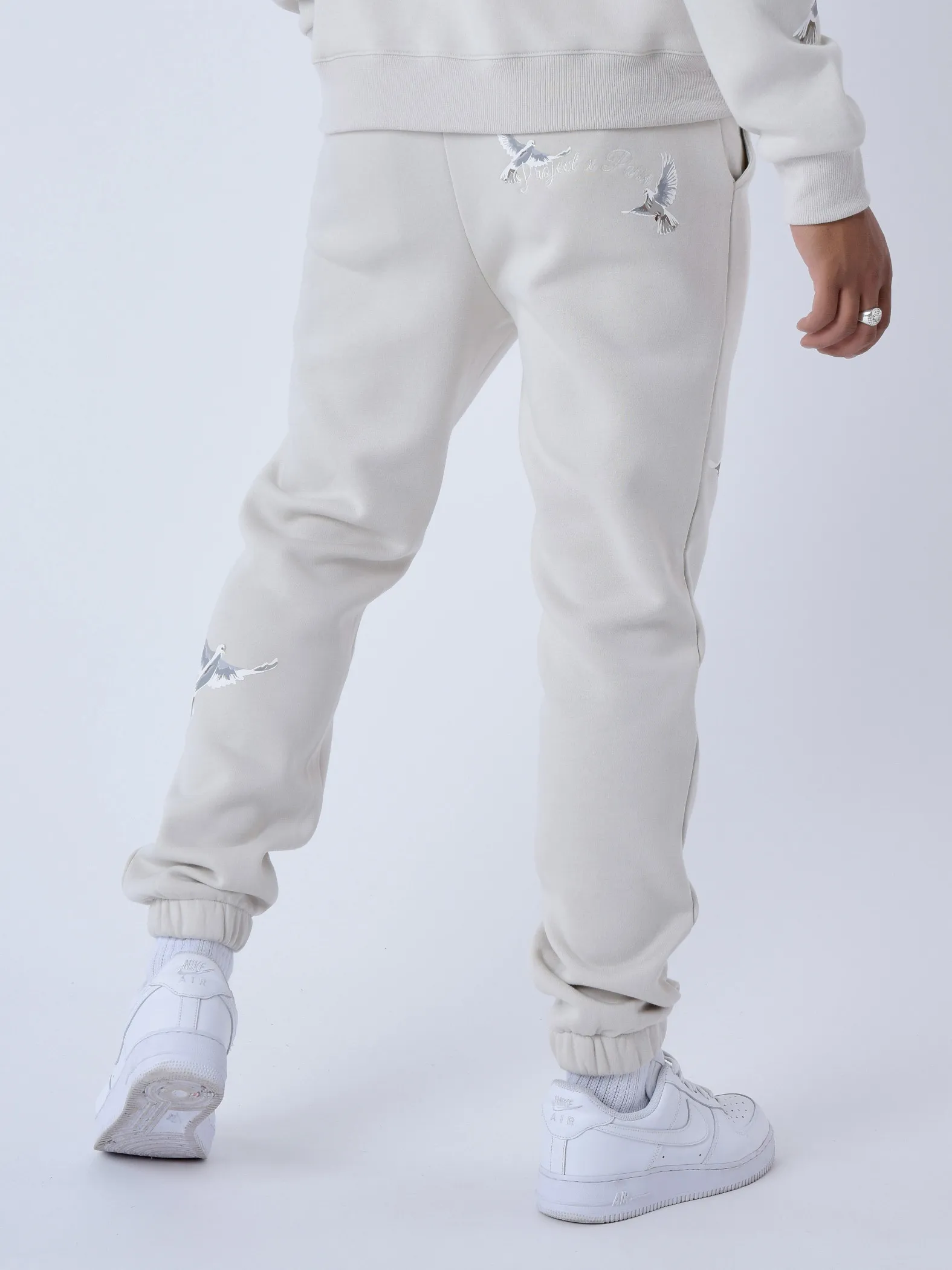 Pantalones de chándal sueltos con estampado de palomas