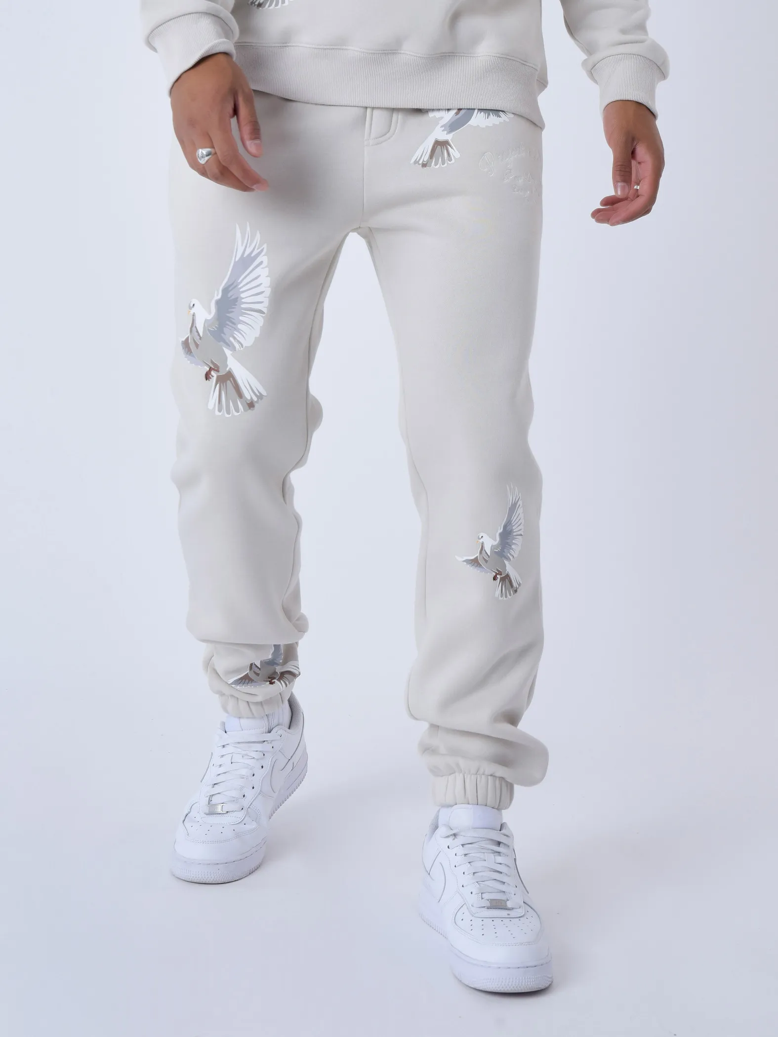 Pantalones de chándal sueltos con estampado de palomas