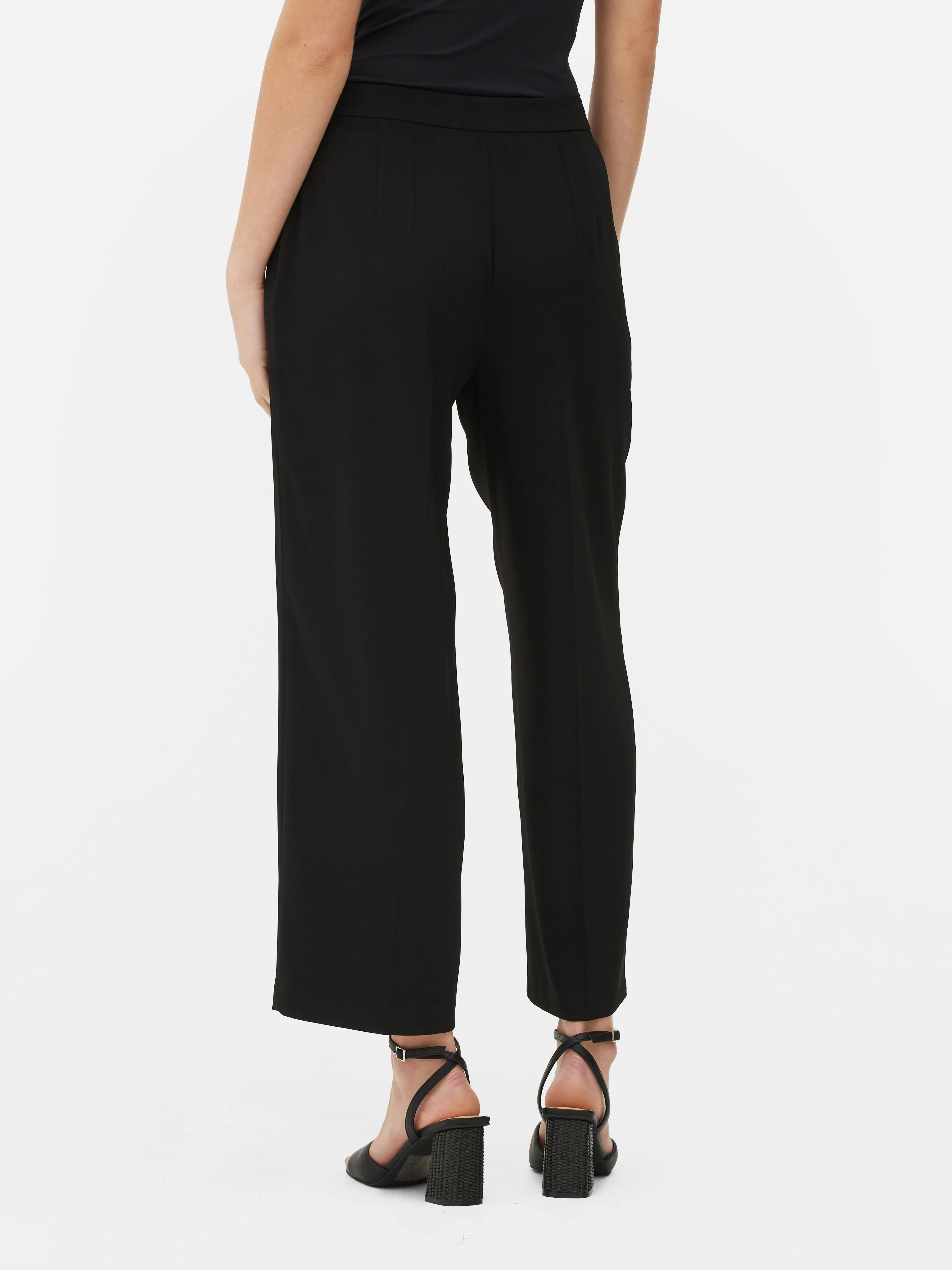 Pantalones de vestir con anilla en «D» en la cintura