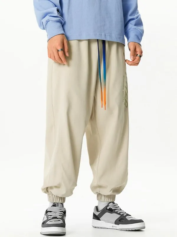 Pantalones jogger casuales sueltos con estampado de letras para hombre